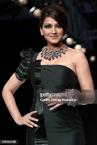 Sonali Bendre walks the runway in a Anand Shah Jewellery design at the India International Jewellery Week 2012 Day 3 at the Grand Hyatt on on August...