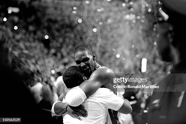 Chris Bosh of the Miami Heat celebrates after the Heat won 121-106 against the Oklahoma City Thunder in Game Five of the 2012 NBA Finals on June 21,...