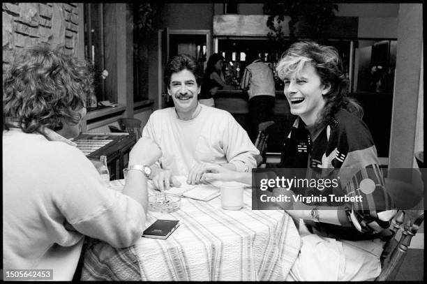 John Taylor of Duran Duran and studio engineers relaxing between sessions in Maison Rouge Studios.