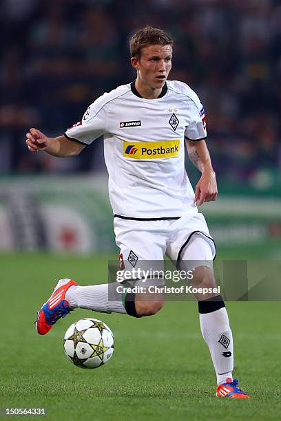 Alexander Ring of Moenchengladbach runs with the ball during the UEFA Champions League play-off first leg match between Borussia Moenchengladbach and...