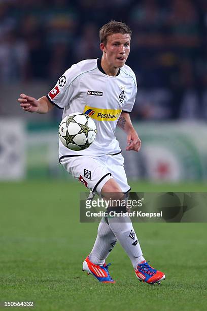 Alexander Ring of Moenchengladbach runs with the ball during the UEFA Champions League play-off first leg match between Borussia Moenchengladbach and...