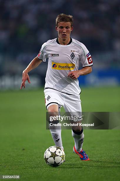 Alexander Ring of Moenchengladbach runs with the ball during the UEFA Champions League play-off first leg match between Borussia Moenchengladbach and...