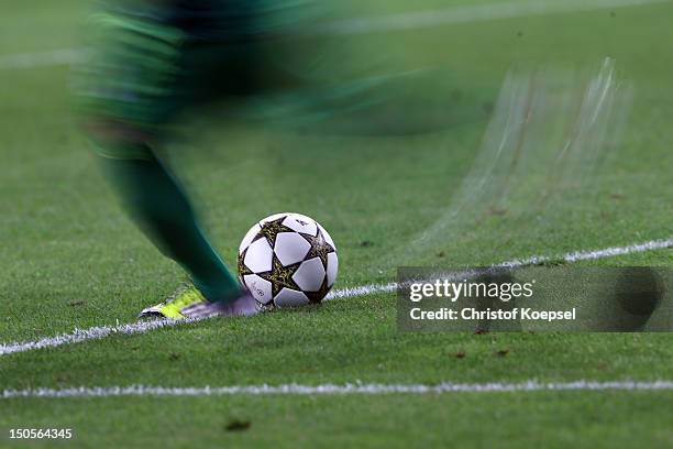 Maxym Koval of Kiew shoots the ball during the UEFA Champions League play-off first leg match between Borussia Moenchengladbach and Dynamo Kiew at...
