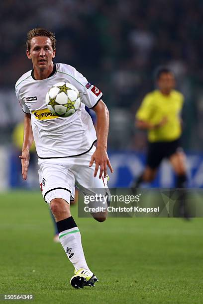 Luuk de Jong of Moenchengladbach runs with the ball during the UEFA Champions League play-off first leg match between Borussia Moenchengladbach and...