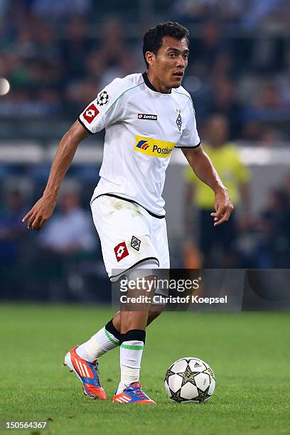 Juan Arrango of Moenchengladbach runs with the ball during the UEFA Champions League play-off first leg match between Borussia Moenchengladbach and...