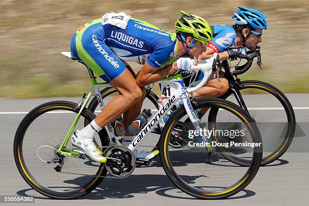 Vincenzo Nibali of Italy riding for Liquigas-Cannondale and Dave Zabriskie of the USA riding for Garmin-Sharp descend the Cerro Summit as they ride...