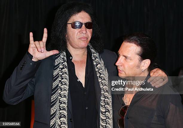 Gene Simmons and Eric Singer of the Rock Band KISS attend the launch of the KISS Monster Book at the Viper Room on August 21, 2012 in West Hollywood,...