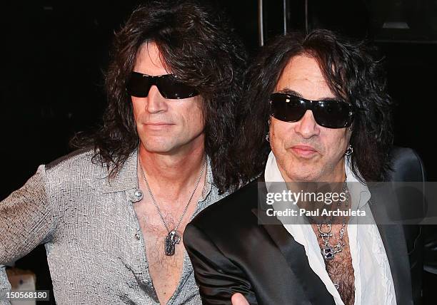 Tommy Thayer and Paul Stanley of the Rock Band KISS attend the launch of the KISS Monster Book at the Viper Room on August 21, 2012 in West...