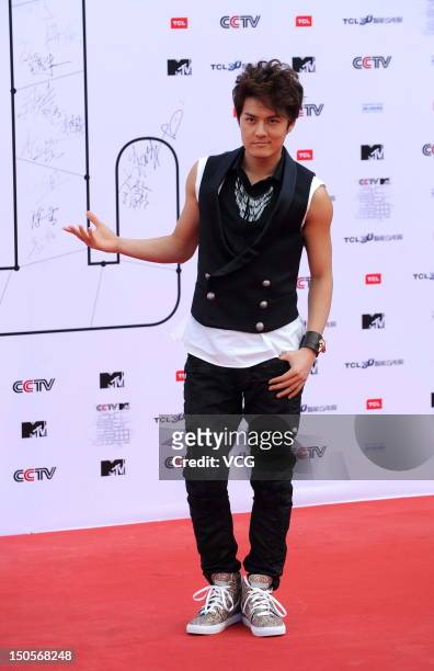 Singer Kenji Wu arrives at the red carpet for the 11th CCTV-MTV Music Awards Ceremony at MasterCard Center on August 21, 2012 in Beijing, China.