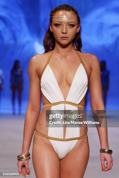 Model showcases designs by Lisa Blue during the Miami Swim show as part of the Mercedes-Benz Fashion Festival Sydney 2012 at Sydney Town Hall on...