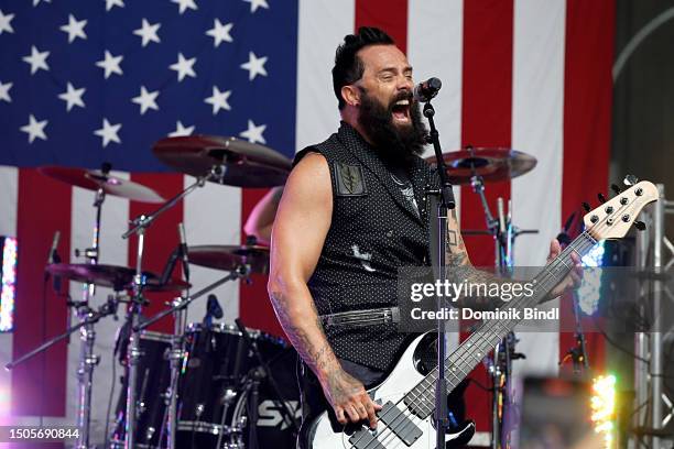 John Cooper of Skillet performs on FOX News Channel's "Fox & Friends" All-American Summer Concert Series outside Fox News Channel Studios at Fox News...