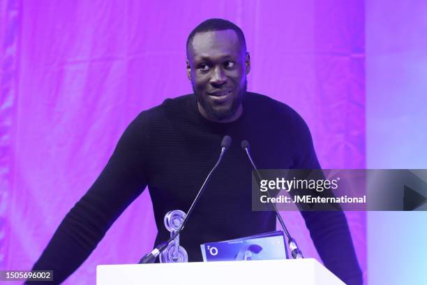 Stormzy speaks on stage during the Nordoff and Robbins O2 Silver Clef Awards 2023 at JW Marriott Grosvenor House on June 30, 2023 in London, England.