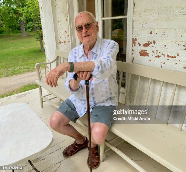 Portrait of American film director James Ivory as he sits on the porch at his home, Claverack, New York, June 23, 2023.