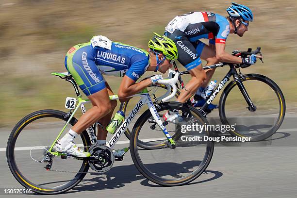 Vincenzo Nibali of Italy riding for Liquigas-Cannondale and Dave Zabriskie of the USA riding for Garmin-Sharp descend the Cerro Summit as they ride...