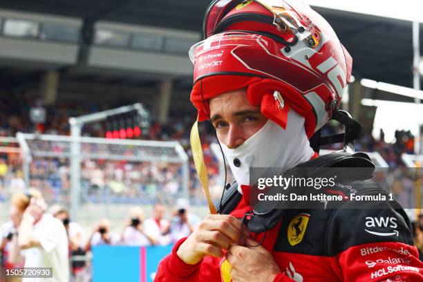 Second placed qualifier Charles Leclerc of Monaco and Ferrari looks on in parc ferme during qualifying ahead of the F1 Grand Prix of Austria at Red...