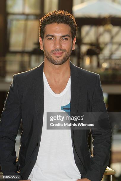 Elyas M'Barek attends the 'Heiter Bis Wolkig' Germany Premiere at Cinedome on MediaPark on August 21, 2012 in Cologne, Germany.