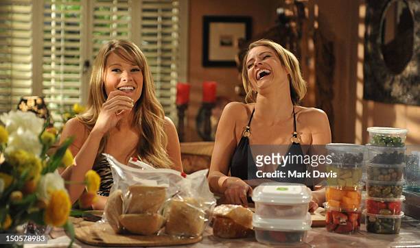 Actors Kim Matula and Linsey Godfrey of CBS' "The Bold And The Beautiful" rehearse on set on March 8, 2012 in Los Angeles, California.