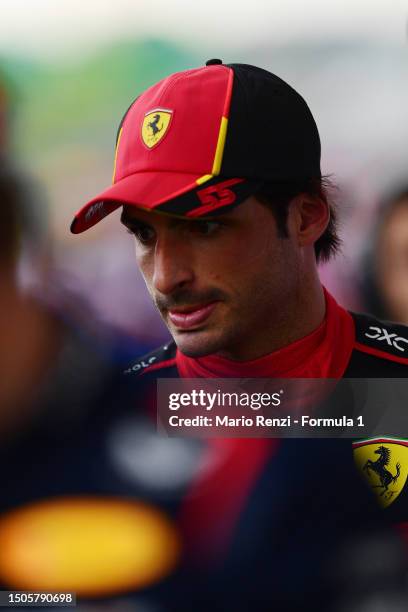 Third placed qualifier Carlos Sainz of Spain and Ferrari looks on in parc ferme during qualifying ahead of the F1 Grand Prix of Austria at Red Bull...