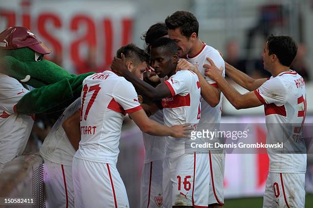 Vedad Ibisevic of Stuttgart celebrates with teammates after scoring his team's first goal during the UEFA Europa League Qualifying Play-Off match...
