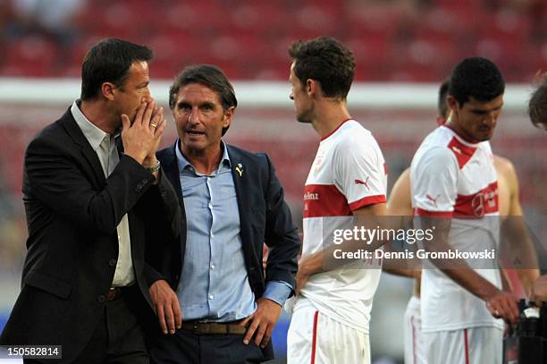 Manager Fredi Bobic of Stuttgart and head coach Bruno Labbadia talk after the UEFA Europa League Qualifying Play-Off match between VfB Stuttgart and...