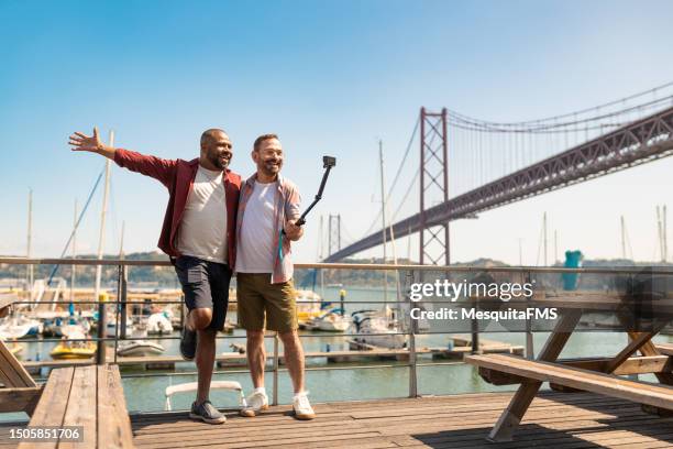 gay couple taking a selfie in lisboa - lisbon district stock pictures, royalty-free photos & images