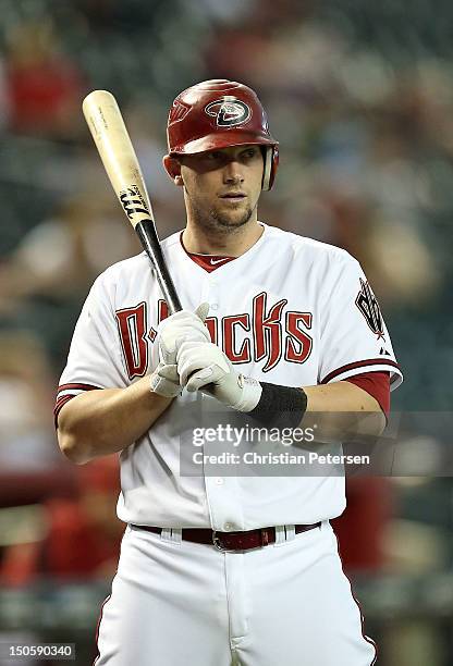 Chris Johnson of the Arizona Diamondbacks waits to bat on deck during game one of the MLB double header against the Miami Marlins at Chase Field on...
