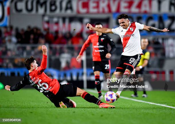 Enzo Diaz of River Plate competes for the ball with Gian Nardelli of Colon during a match between River Plate and Colon as part of Liga Profesional...