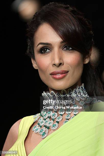 Malaika Arora Khan walks the runway in a KGK Entice Jewellery design at the India International Jewellery Week 2012 Day 4 at the Grand Hyatt on...