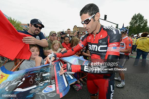 George Hincapie of the United States riding for BMC Racing signs autographs prior to the start of Stage Three of the USA Pro Challenge from Gunnison...