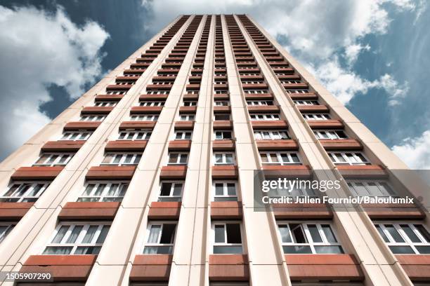 low angle apartment building in paris, france - council in paris stock-fotos und bilder