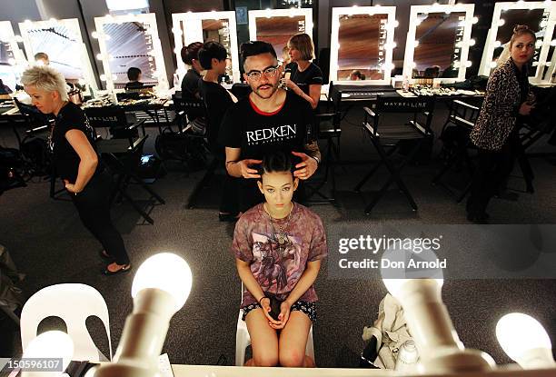 Model perpares backstage ahead of the Oroton show as part of the Mercedes-Benz Fashion festival Sydney 2012 on August 23, 2012 in Sydney, Australia.