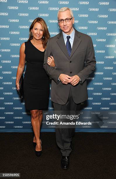 Addiction specialist Dr. Drew Pinsky and his wife Susan Pinsky arrive at The Substance Abuse And Mental Health Services Administration 2012 Voice...