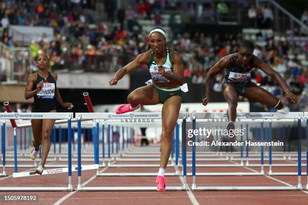 Jasmine Camacho-Quinn of Puerto Rico competes in the Women's 100m Hurdles Final during Athletissima, part of the 2023 Diamond League series at Stade...