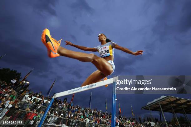 Lina Nielsen of Great Britain competes in the Women's 400m Hurdles final during Athletissima, part of the 2023 Diamond League series at Stade...