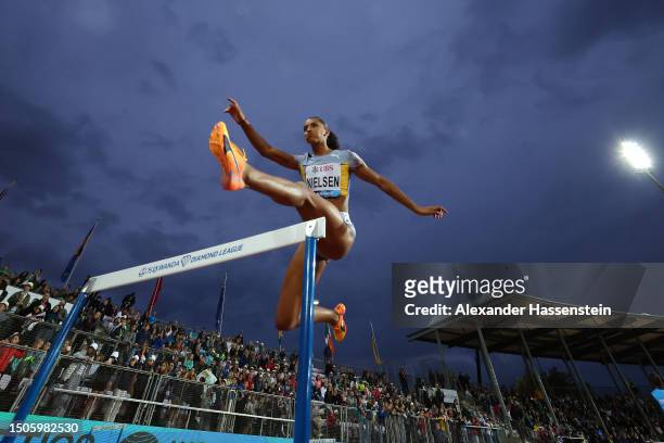 Lina Nielsen of Great Britain competes in the Women's 400m Hurdles final during Athletissima, part of the 2023 Diamond League series at Stade...