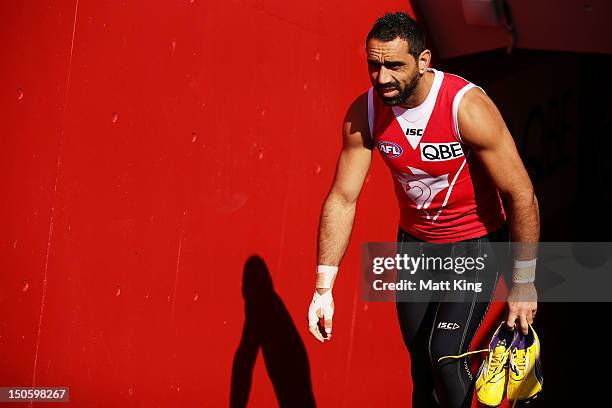 Adam Goodes walks onto the SCG during a Sydney Swans AFL training session at Sydney Cricket Ground on August 23, 2012 in Sydney, Australia.