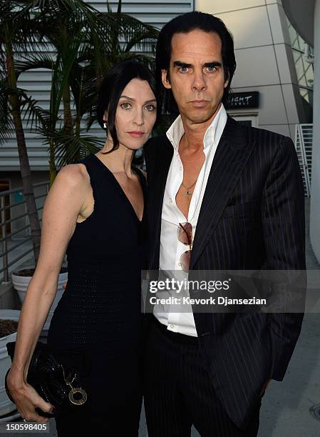 Screenwriter/composer Nick Cave, and his wife Susie Cave arrive for the premiere of the Weinstein Company's "Lawless" at ArcLight Cinemas on August...