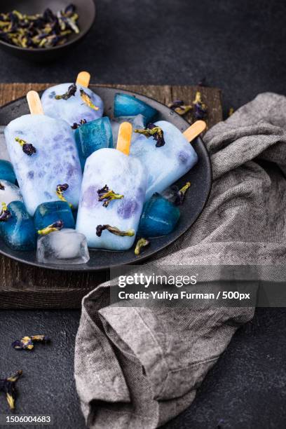 high angle view of food in plate on table - clitoria - fotografias e filmes do acervo