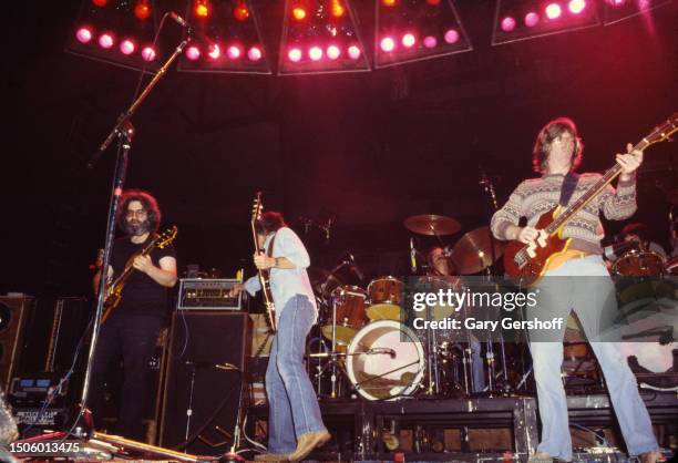 View of members of the Rock group Grateful Dead as they perform onstage at Nassau Coliseum , Uniondale, New York, November 1, 1979. Visible are, from...