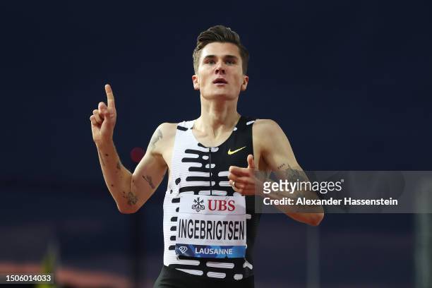Jakob Ingebrigtsen of Norway celebrates after winning the Men's 1500m final during Athletissima, part of the 2023 Diamond League series at Stade...