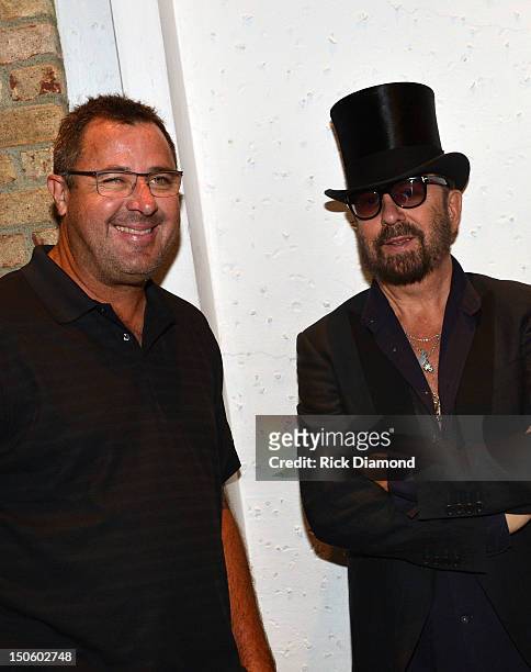 Singer/Songwriter/Humorist Vince Gill and Singer/Songwriter/host Dave Stewart attend the "The Ringmaster General" premiere at the Belcourt Theater on...
