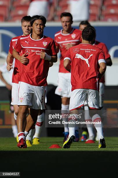 Shinji Okazaki of Stuttgart warms up piror to the UEFA Europa League Qualifying Play-Off match between VfB Stuttgart and FC Dynamo Moscow at...
