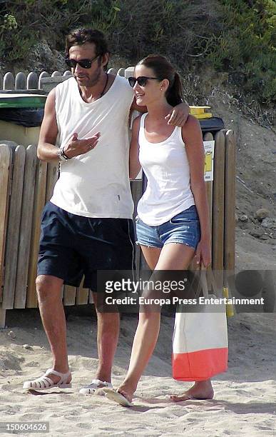 Spanish actor Jordi Molla and his girlfriend are seen on August 9, 2012 in Ibiza, Spain.