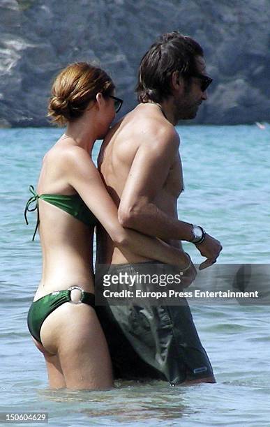 Spanish actor Jordi Molla and his girlfriend are seen on August 9, 2012 in Ibiza, Spain.