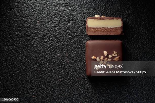 directly above shot of chocolates on table,finland - praline stock pictures, royalty-free photos & images