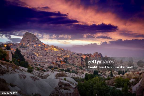 uchisar castle & sunset - göreme stock pictures, royalty-free photos & images