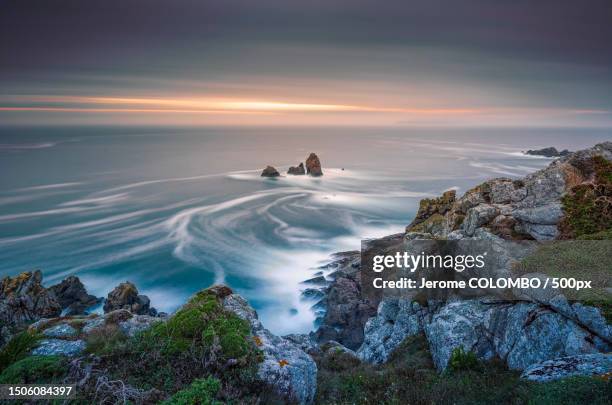 scenic view of sea against sky during sunset,france - finistere stock-fotos und bilder