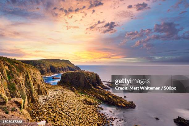 scenic view of sea against sky during sunset,penzance,united kingdom,uk - penzance stock pictures, royalty-free photos & images