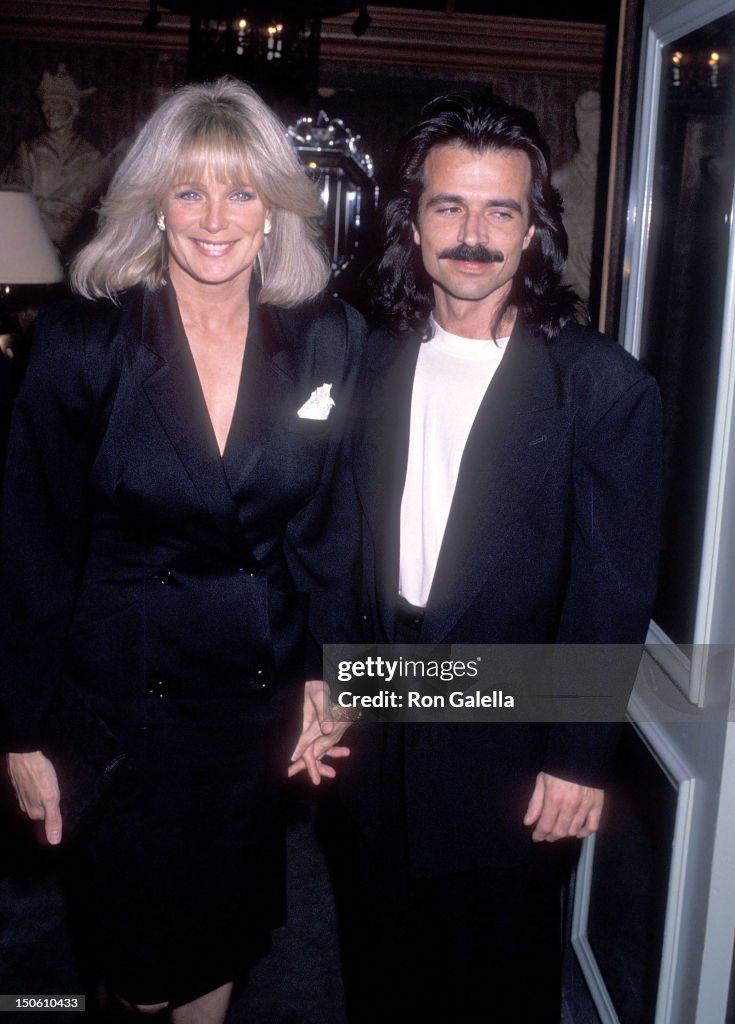 Actress Linda Evans and musician Yanni attend the Reebok's Cocktail... News Photo Getty Images