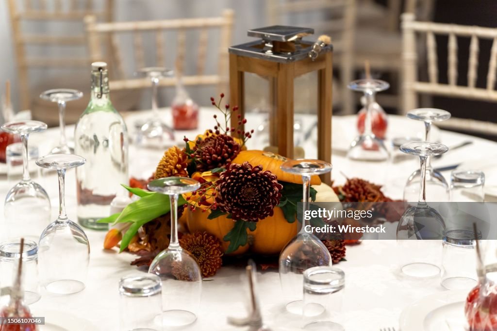 A close up shot of a wedding table with beautiful decorations